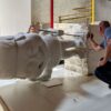 EPS expanded polystyrene foam being sculptured into a statue